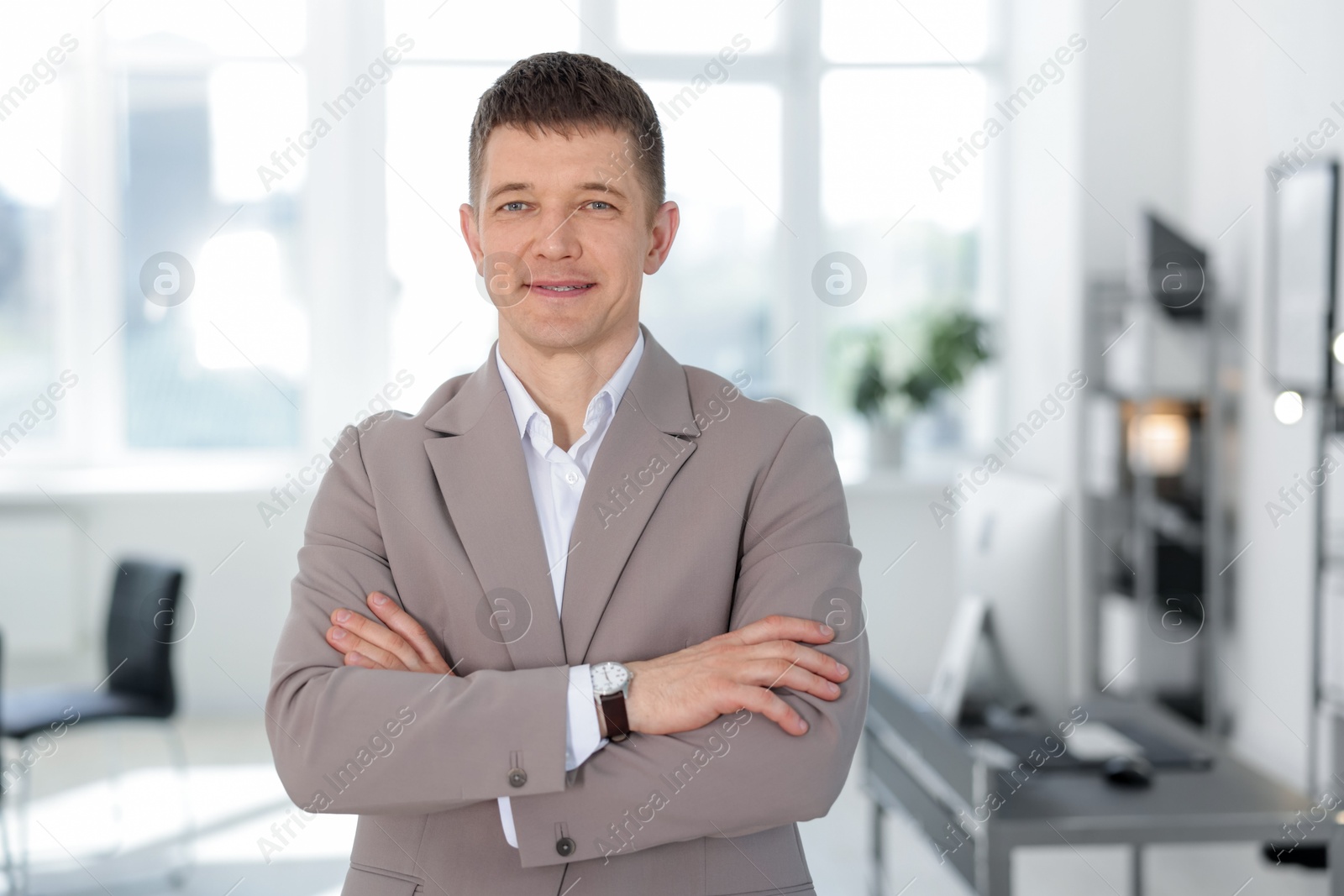 Portrait of handsome middle aged man in office Photo of Portrait of handsome middle aged man in office