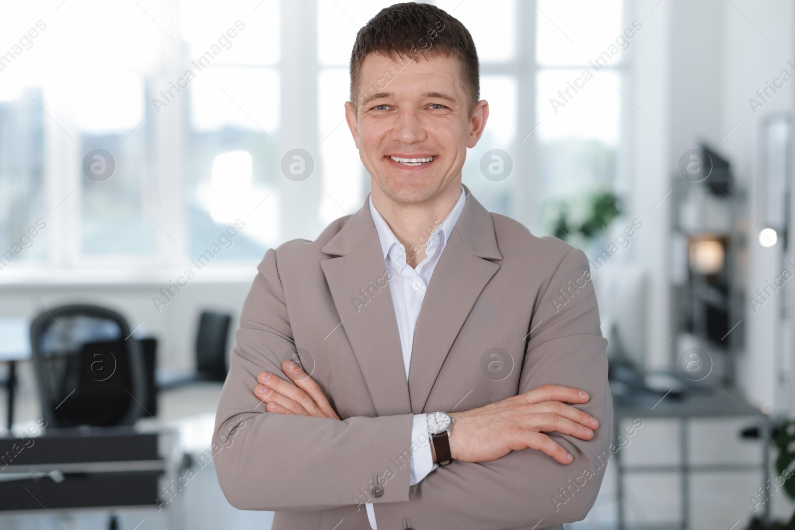 Portrait of handsome middle aged man in office Photo of Portrait of handsome middle aged man in office