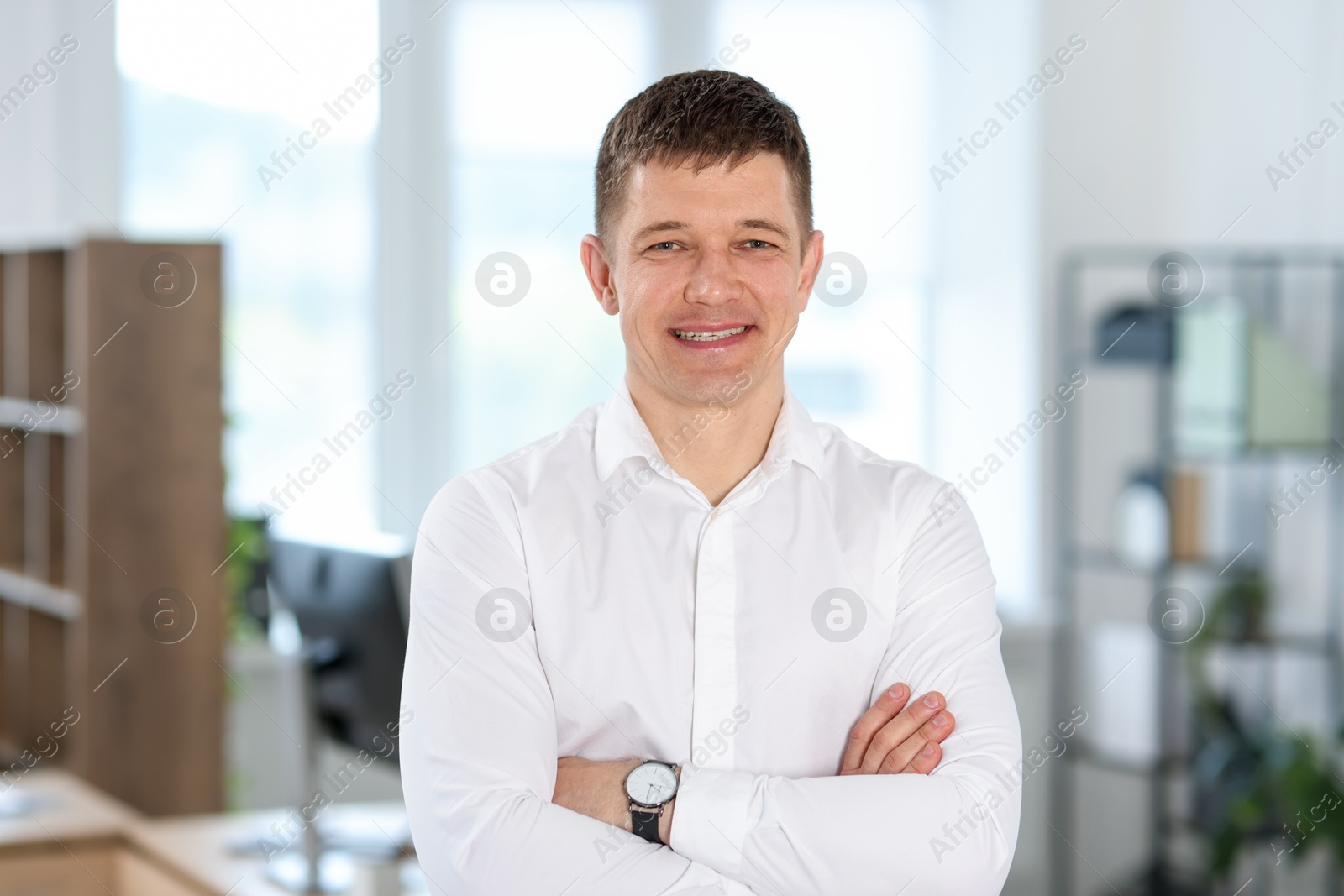 Portrait of handsome middle aged man indoors Photo of Portrait of handsome middle aged man indoors