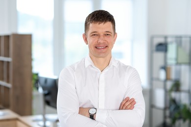 Photo of Portrait of handsome middle aged man indoors