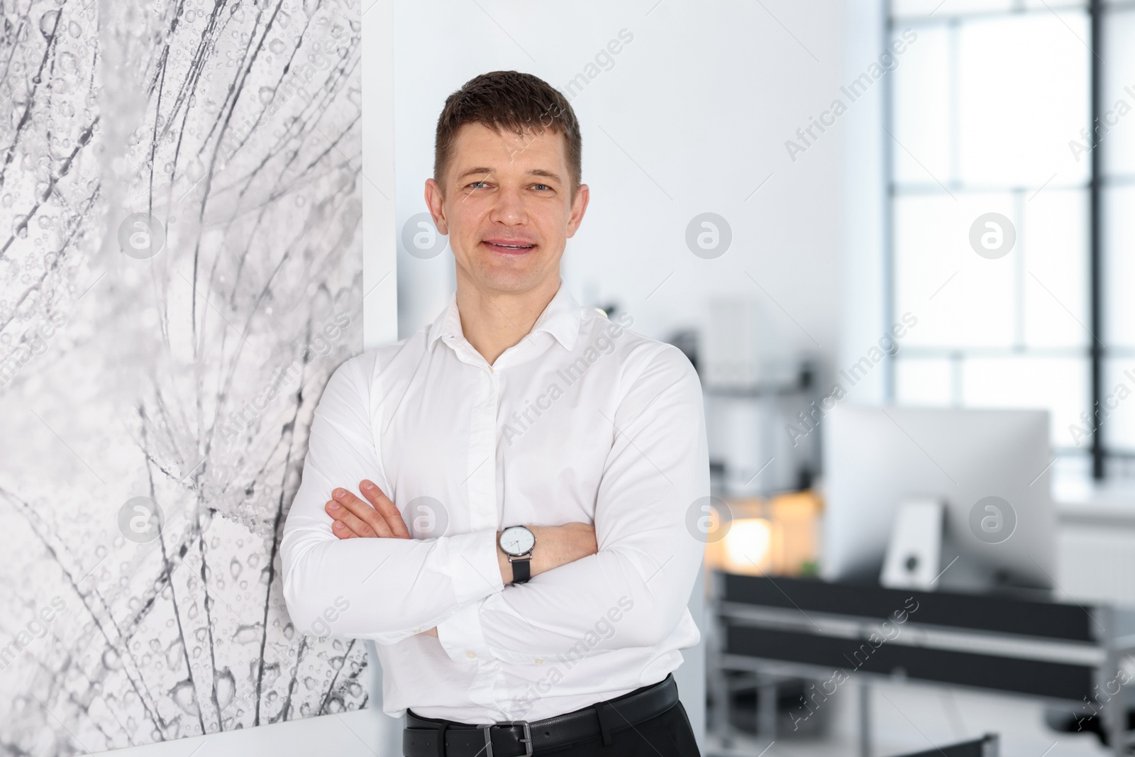 Portrait of handsome middle aged man indoors. Space for text Photo of Portrait of handsome middle aged man indoors. Space for text