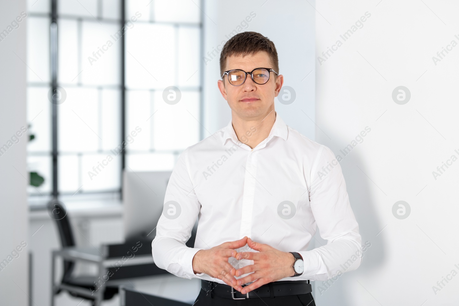 Portrait of handsome middle aged man indoors Photo of Portrait of handsome middle aged man indoors