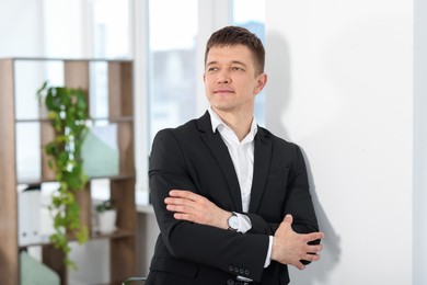 Photo of Portrait of handsome middle aged man indoors