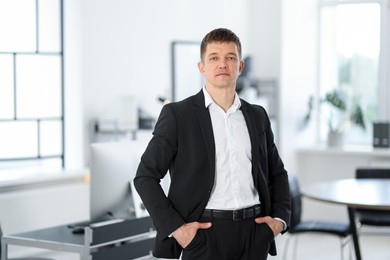 Photo of Portrait of handsome middle aged man indoors