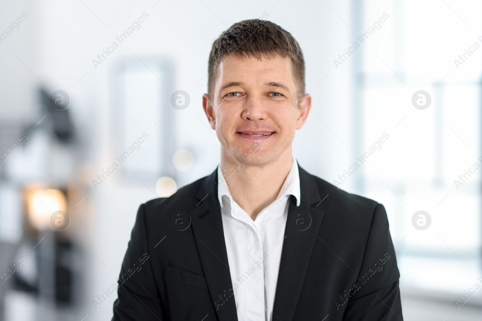 Portrait of handsome middle aged man indoors Photo of Portrait of handsome middle aged man indoors