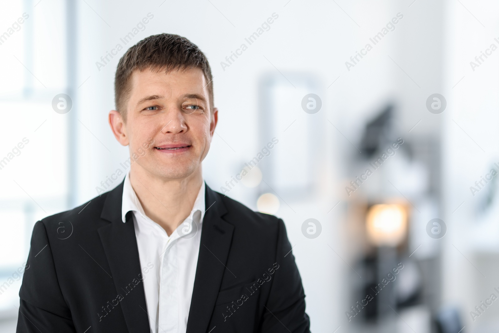 Portrait of handsome middle aged man indoors. Space for text Photo of Portrait of handsome middle aged man indoors. Space for text