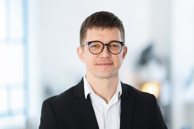 Photo of Portrait of handsome middle aged man indoors
