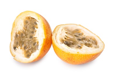 Photo of Pieces of ripe yellow passion fruit isolated on white