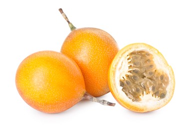 Photo of Ripe yellow passion fruits isolated on white