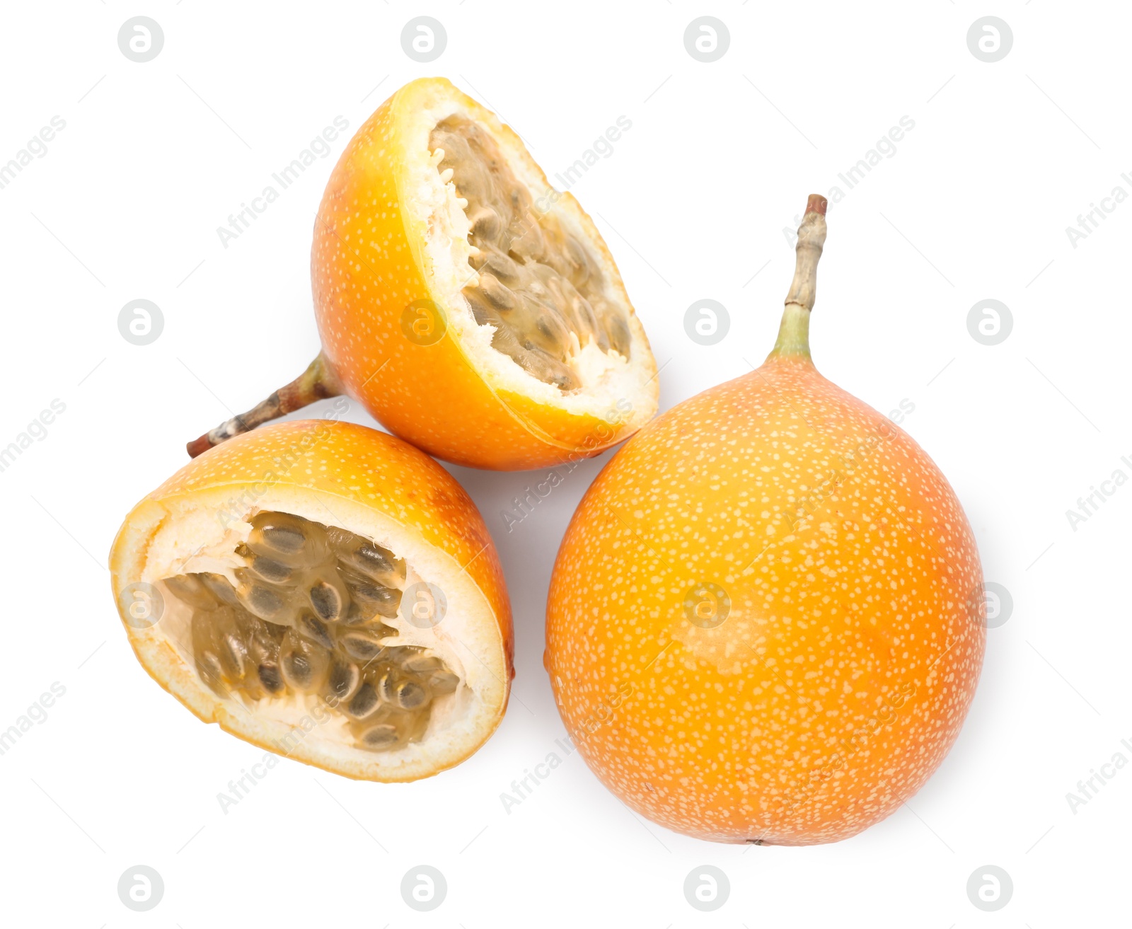 Ripe yellow passion fruits isolated on white, top view Photo of Ripe yellow passion fruits isolated on white, top view