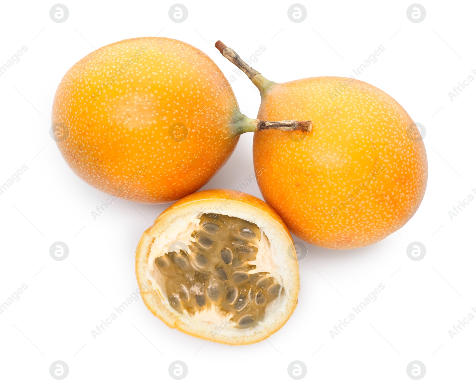 Ripe yellow passion fruits isolated on white, top view Photo of Ripe yellow passion fruits isolated on white, top view