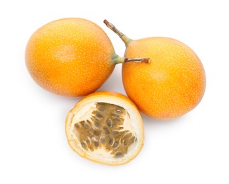 Photo of Ripe yellow passion fruits isolated on white, top view