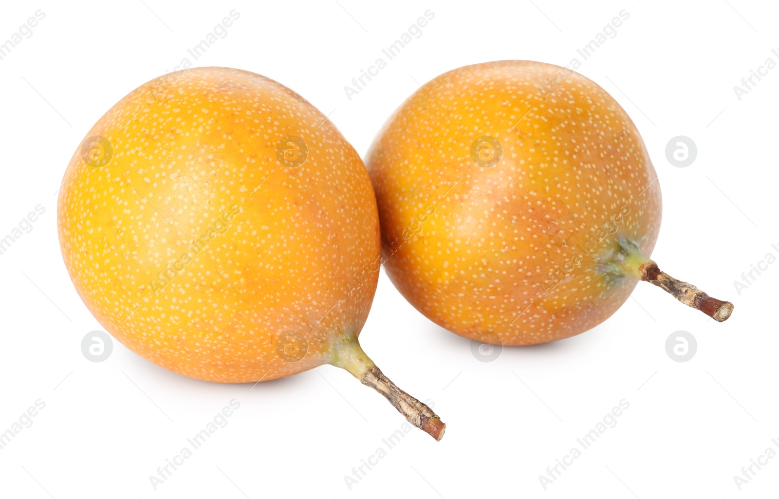 Whole ripe yellow passion fruits isolated on white Photo of Whole ripe yellow passion fruits isolated on white