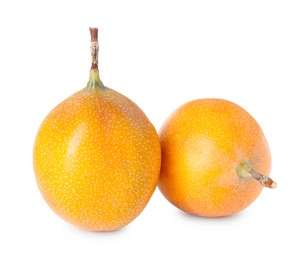 Photo of Whole ripe yellow passion fruits isolated on white