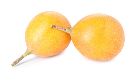 Photo of Whole ripe yellow passion fruits isolated on white