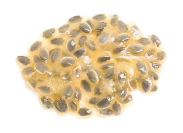 Photo of Passion fruit seeds isolated on white, top view