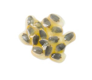Photo of Passion fruit seeds isolated on white, top view