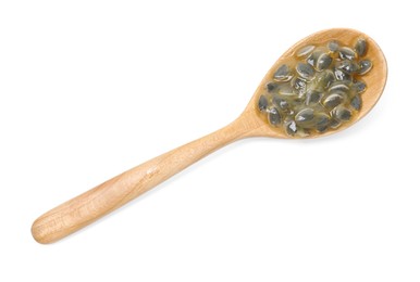 Photo of Passion fruit seeds in spoon isolated on white, top view