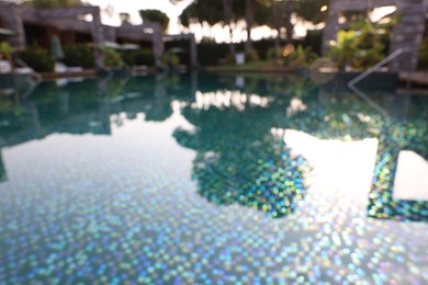 Photo of Outdoor swimming pool at resort, blurred view