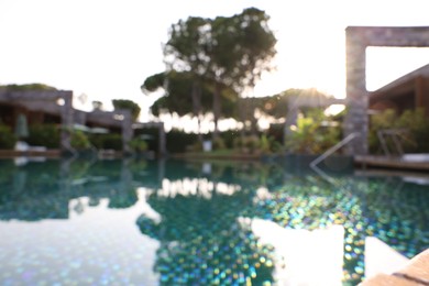 Photo of Outdoor swimming pool at resort, blurred view