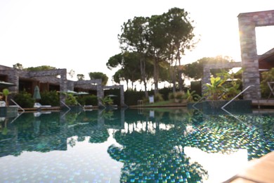 Photo of Outdoor swimming pool at resort, blurred view