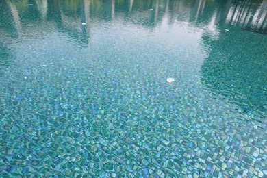 Photo of Clear water with ripples in swimming pool outdoors