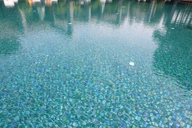 Photo of Clear water with ripples in swimming pool outdoors