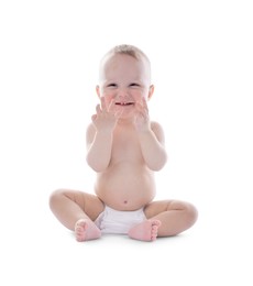 Photo of Portrait of cute little baby on white background