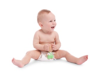 Photo of Cute little baby with toy on white background