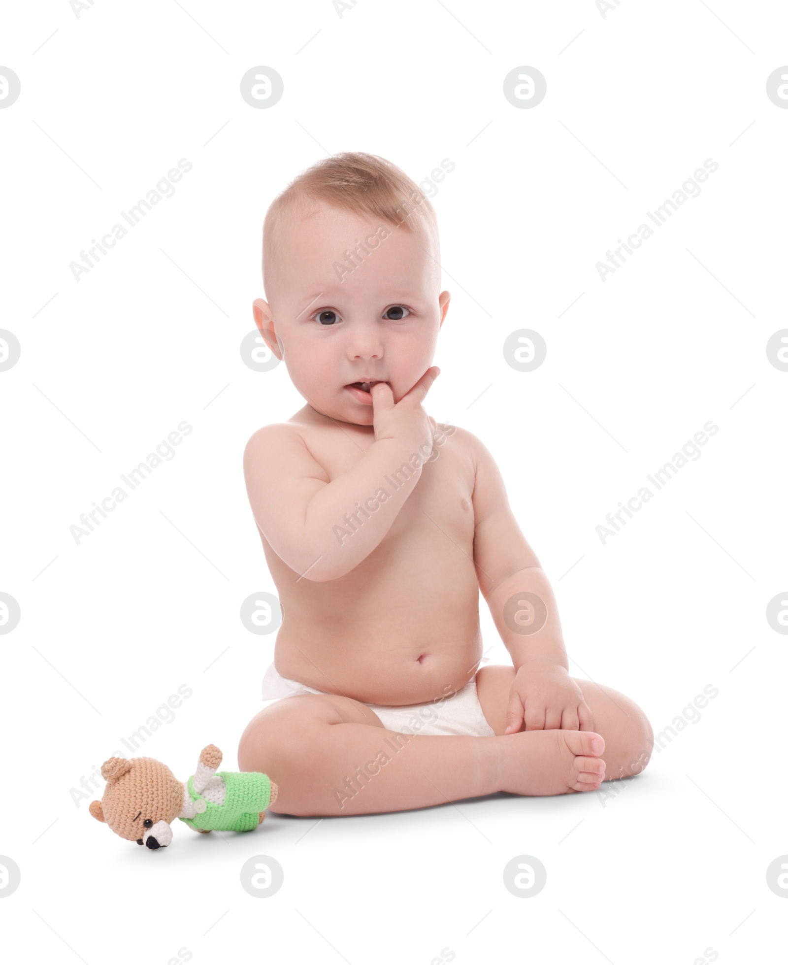 Cute little baby with toy on white background Photo of Cute little baby with toy on white background