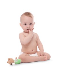Photo of Cute little baby with toy on white background