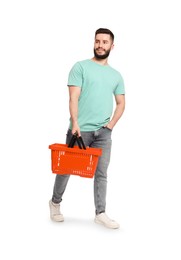 Photo of Man with empty shopping basket on white background
