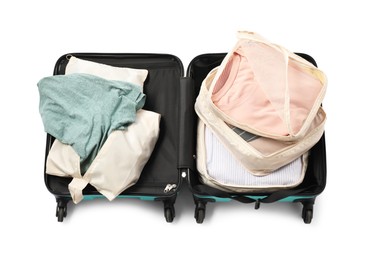 Photo of Open suitcase with packing cubes isolated on white, top view
