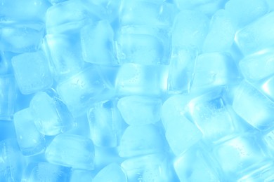 Photo of Cubes of clear ice as background, top view