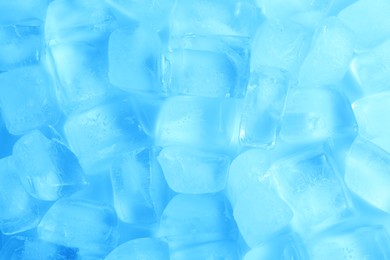 Photo of Cubes of clear ice as background, top view