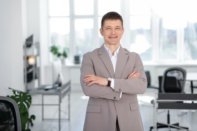 Photo of Portrait of handsome middle aged man in office
