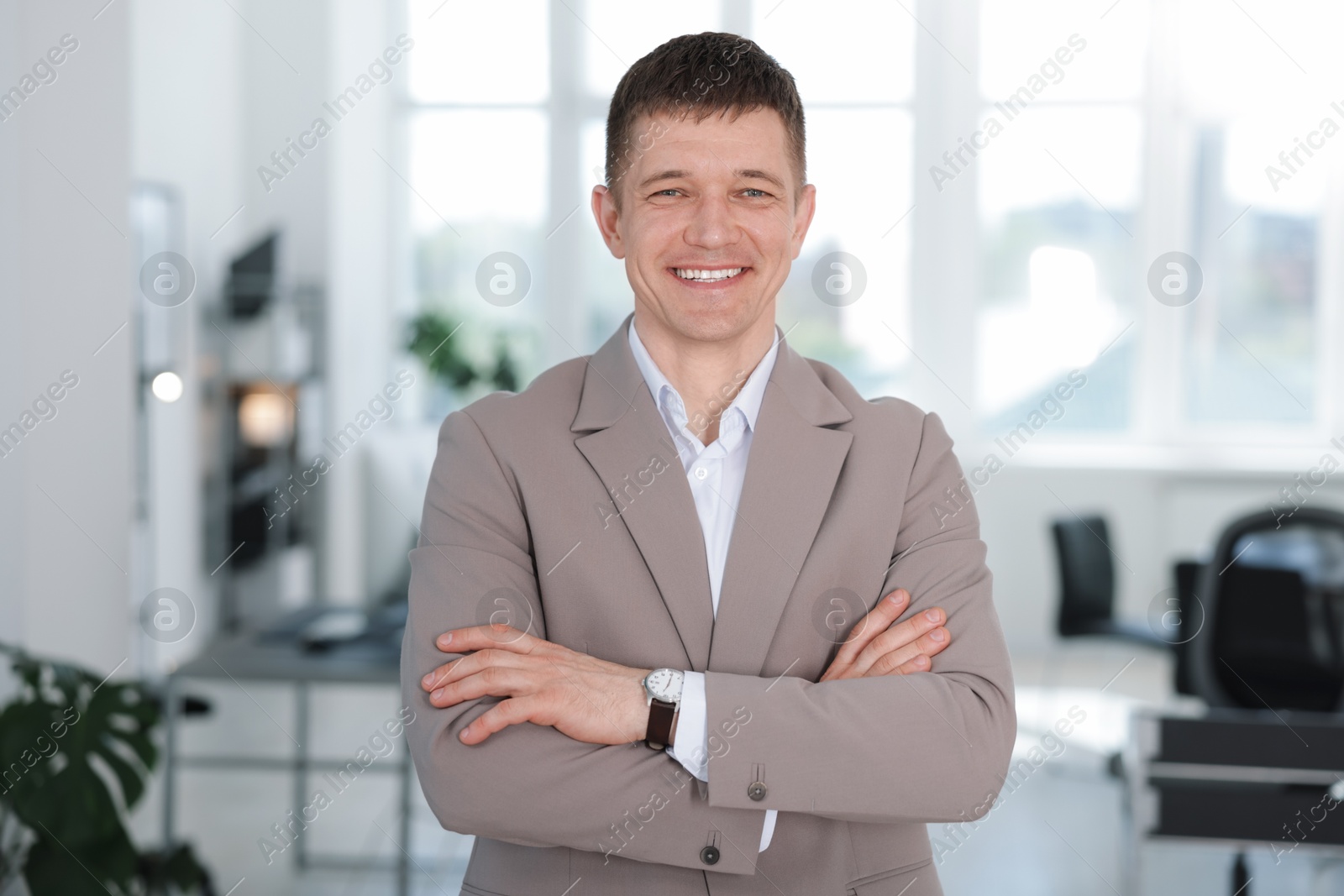 Portrait of handsome middle aged man in office Photo of Portrait of handsome middle aged man in office