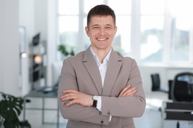 Photo of Portrait of handsome middle aged man in office
