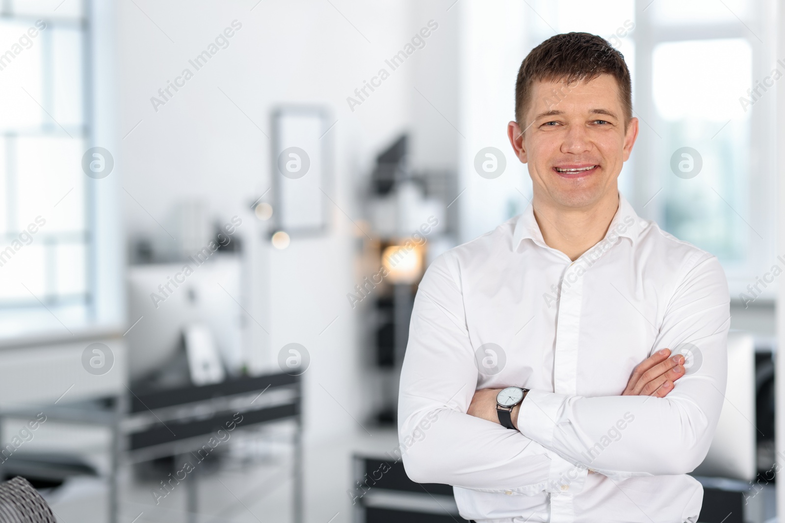 Portrait of handsome middle aged man indoors. Space for text Photo of Portrait of handsome middle aged man indoors. Space for text