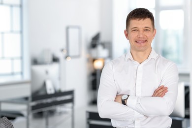 Photo of Portrait of handsome middle aged man indoors. Space for text