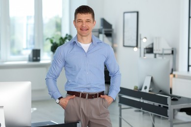 Photo of Portrait of handsome middle aged man indoors