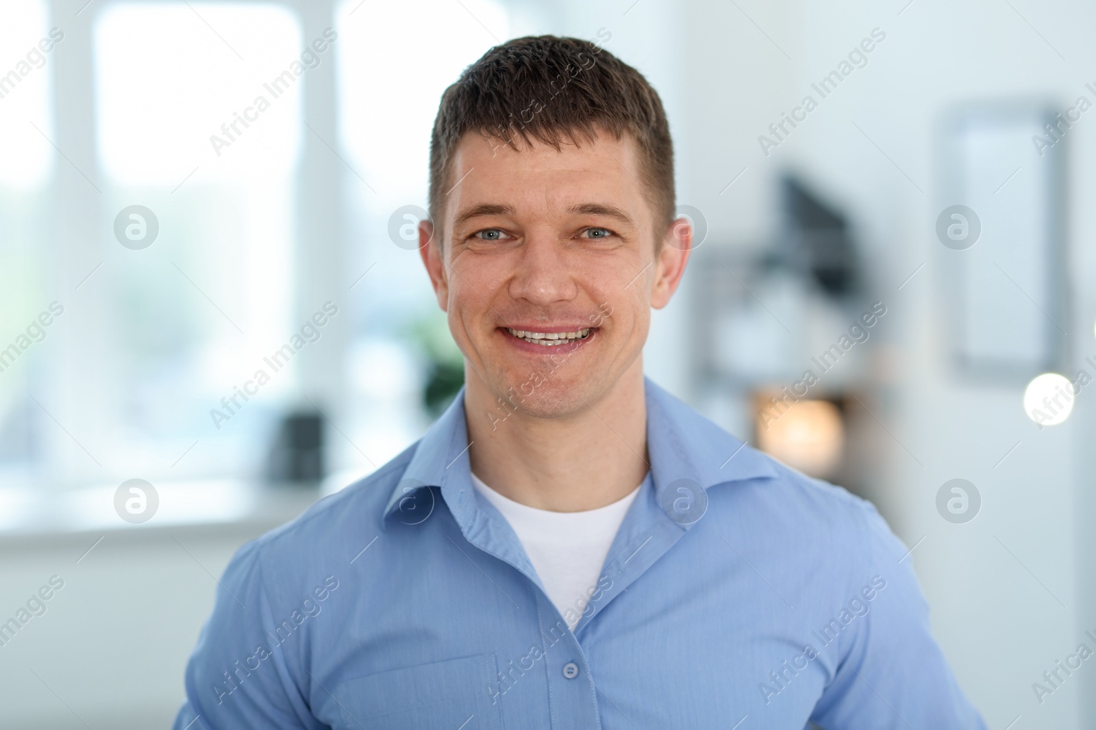 Portrait of handsome middle aged man indoors Photo of Portrait of handsome middle aged man indoors