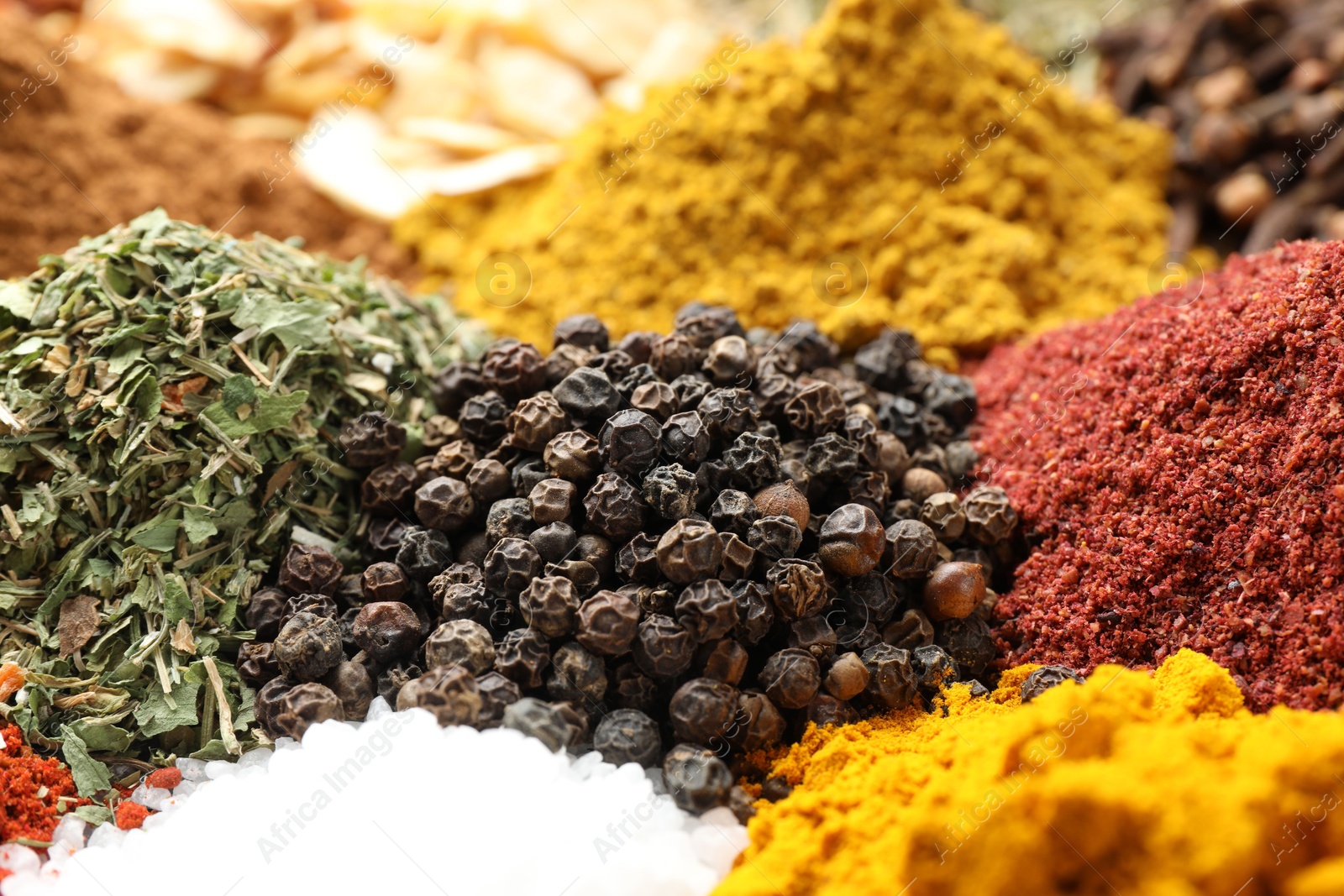 Many different spices as background, closeup view Photo of Many different spices as background, closeup view