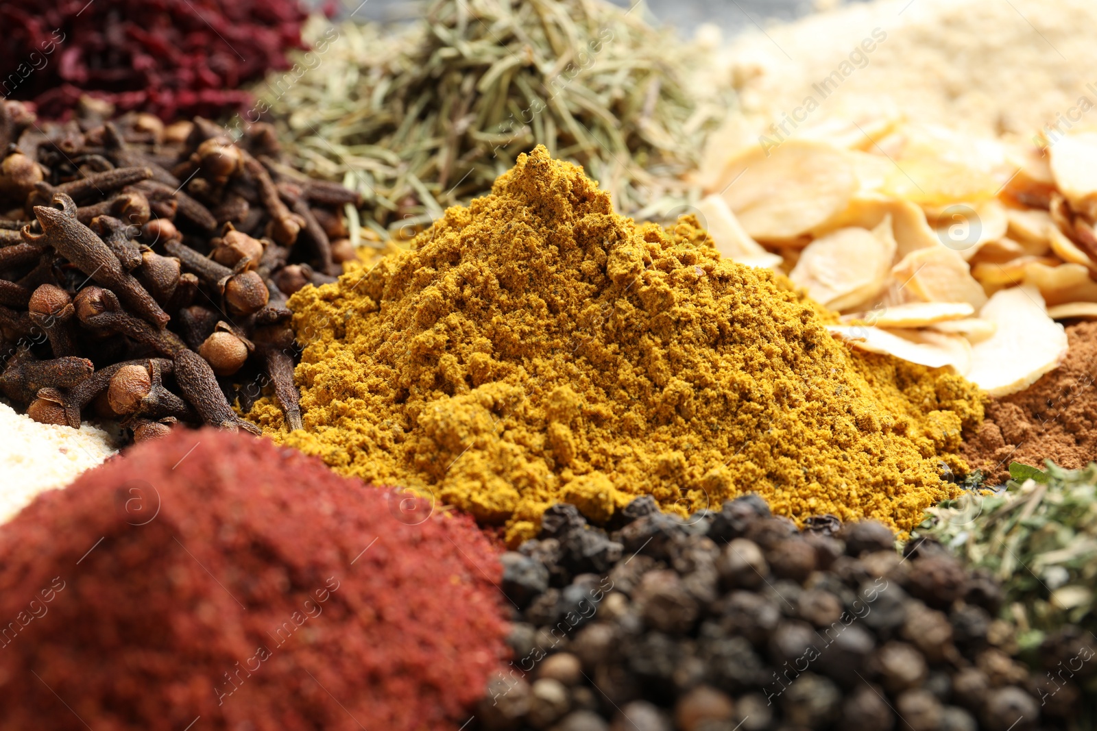 Many different spices as background, closeup view Photo of Many different spices as background, closeup view