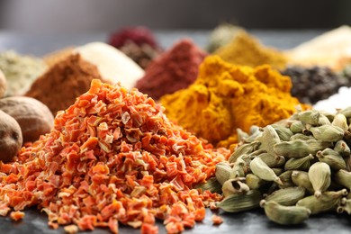 Photo of Many different spices on table, closeup view