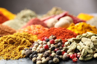 Photo of Many different spices on table, closeup view