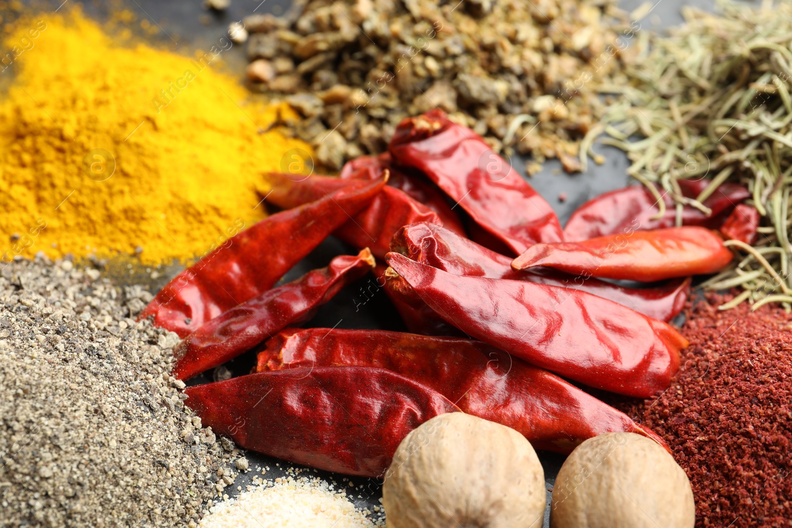 Many different spices on table, closeup view Photo of Many different spices on table, closeup view