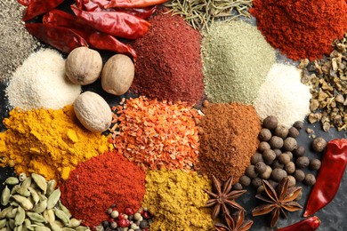 Photo of Many different spices on table, flat lay