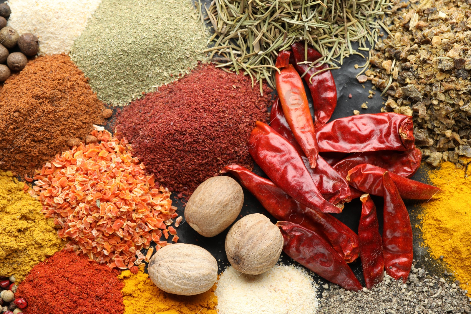 Many different spices on table, flat lay Photo of Many different spices on table, flat lay