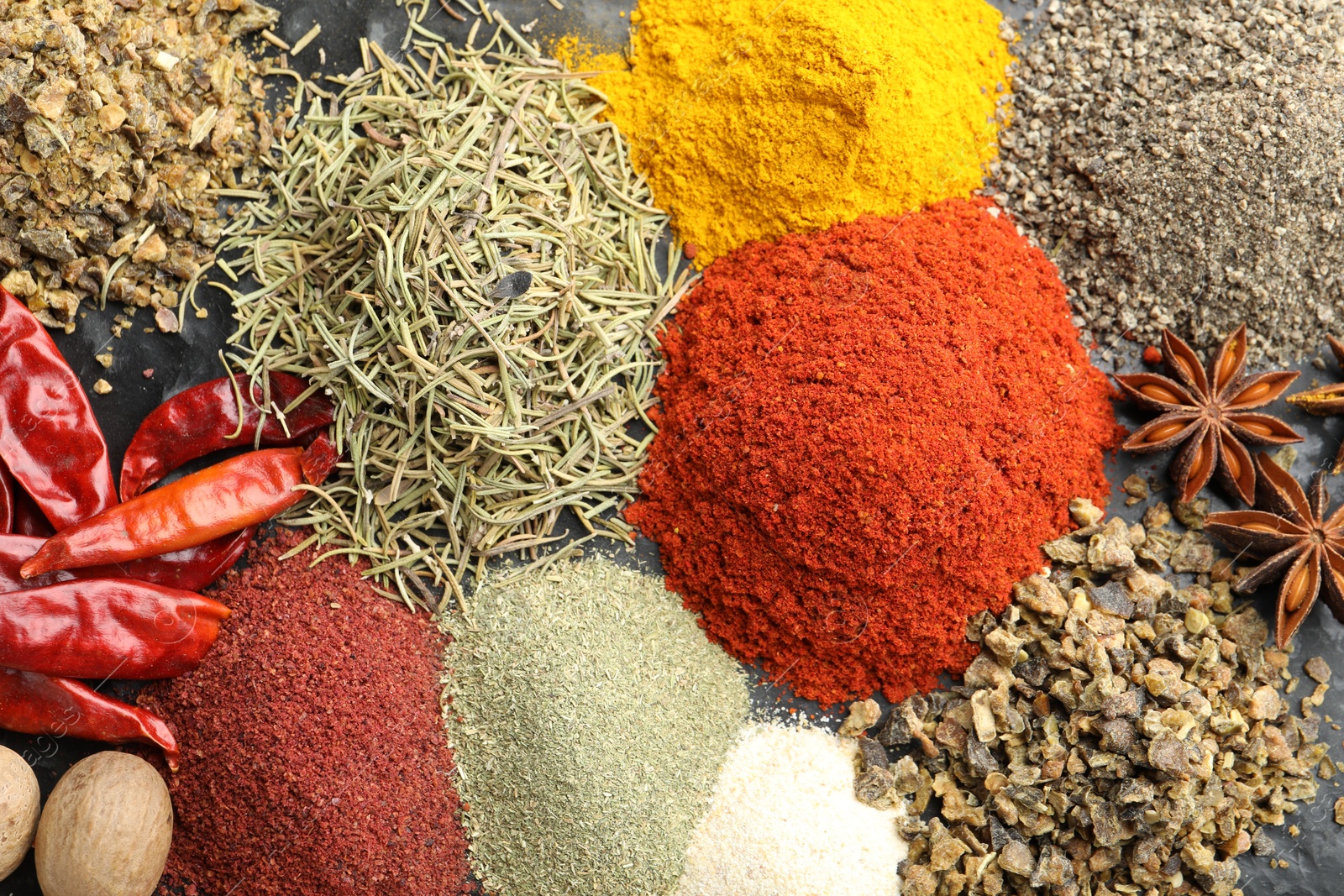 Many different spices on table, flat lay Photo of Many different spices on table, flat lay